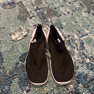 Never worn black Nike water shoes size 5